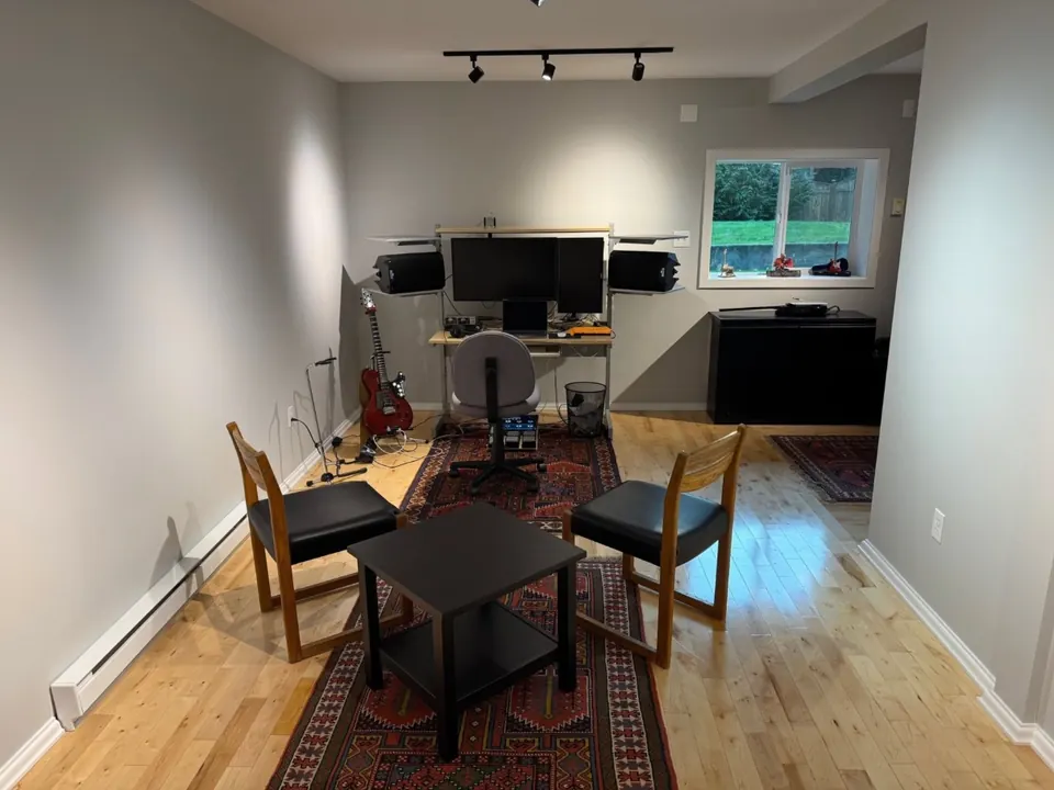 Home studio with freshly painted light grey walls